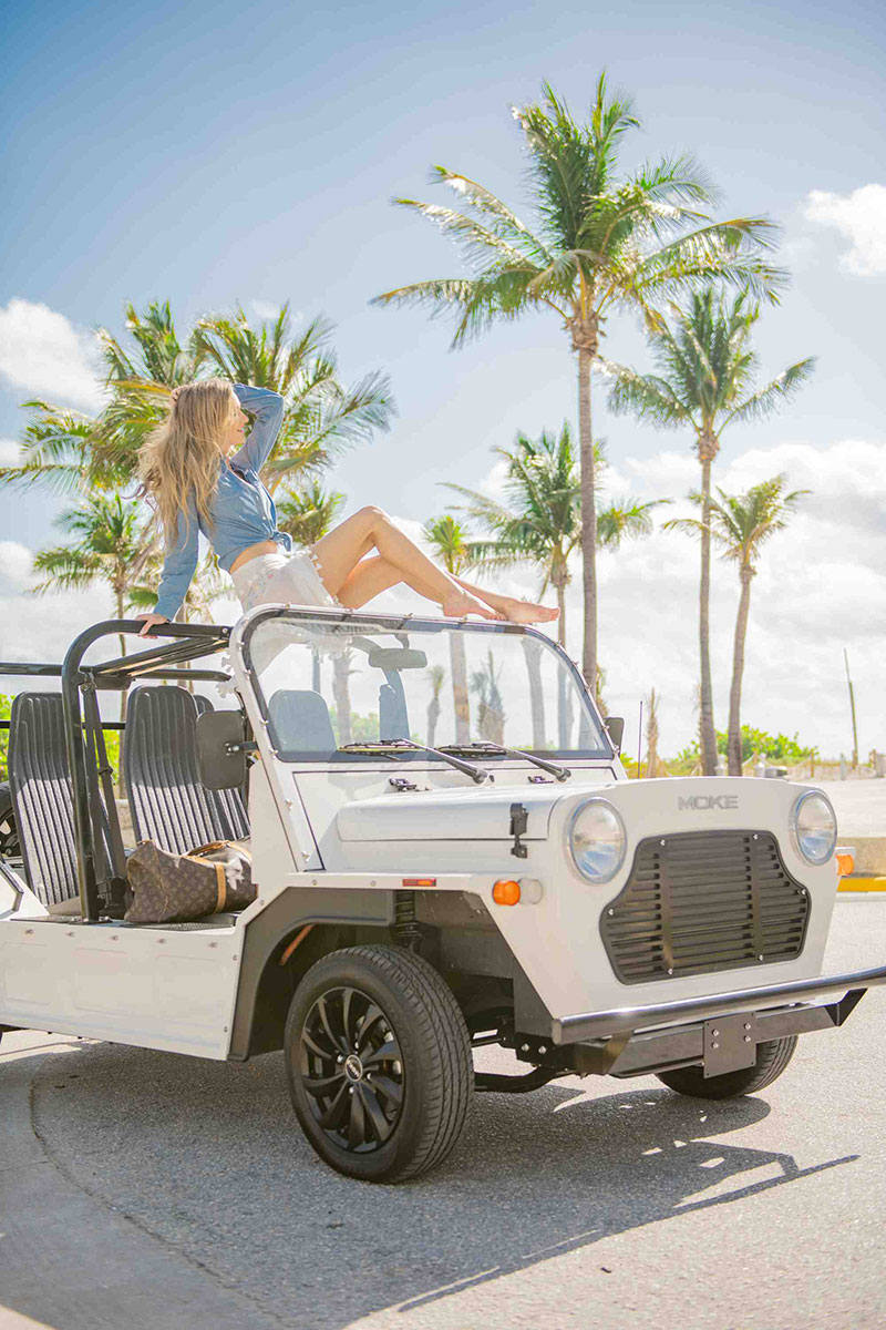 Girl on white Moke